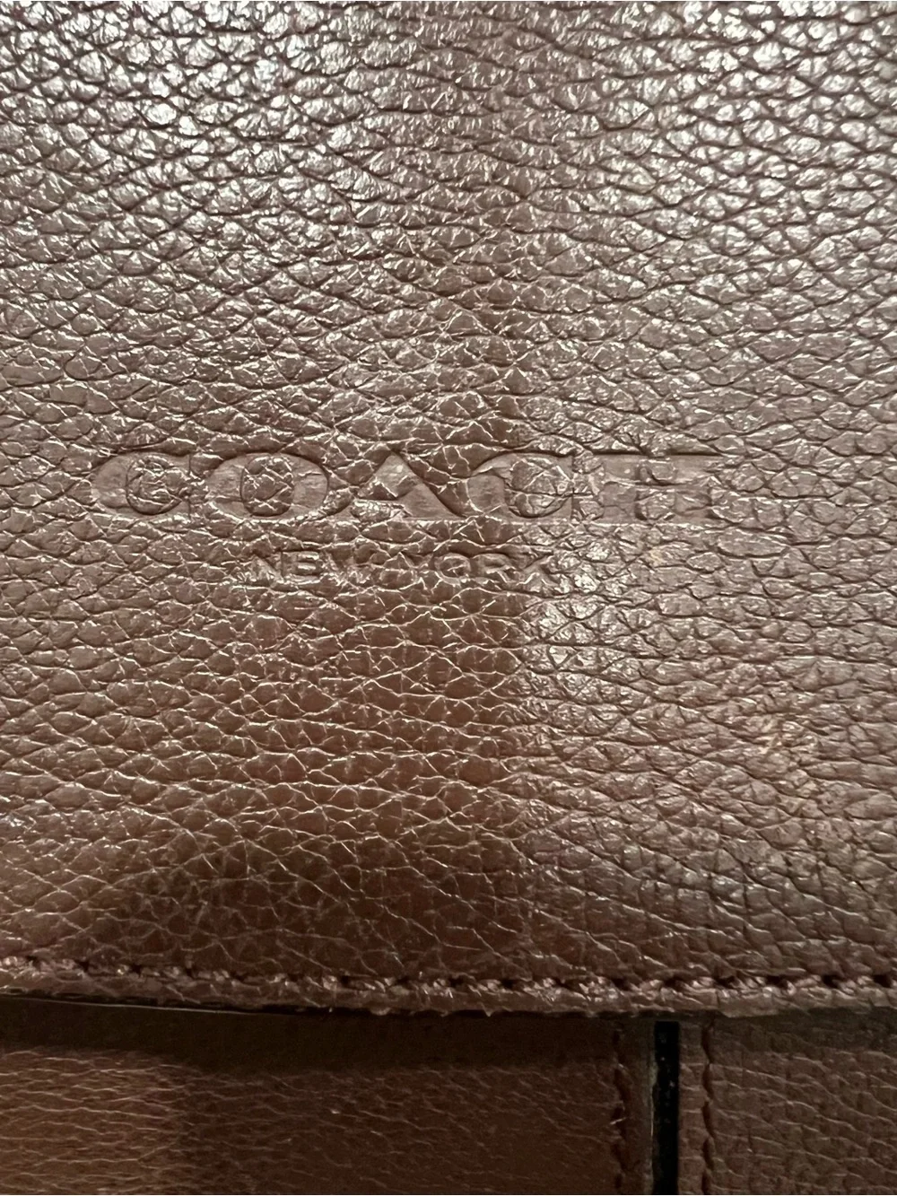 Coach sleek dark